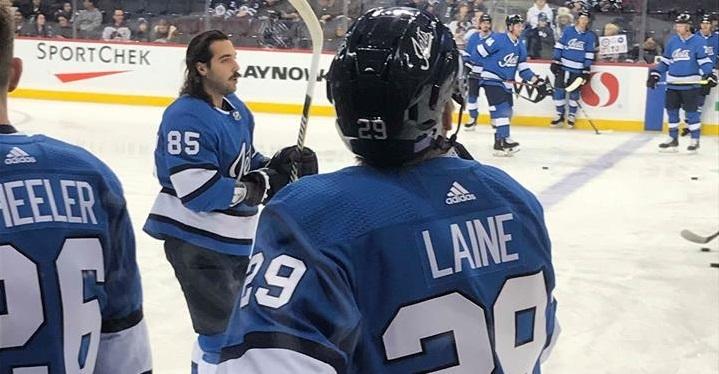 Patrik Laine takes the ice at Bell MTS Place.