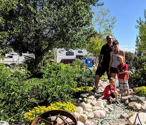 Lise and Bruce Bale with two of their three children after another busy day managing the Arrowhead RV Park