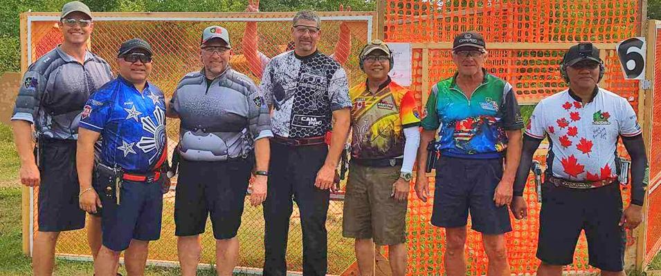 The Manitoba Machine: Paul Richards, Peter Felisario, Doug Engstrom, Paul Little, Oscar De Paulo, David Bullock, and Paul Umali