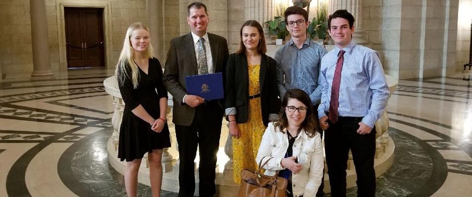 Leah Reimer, Shannon Martin, Maddie Thompson, Marcus Jofre, and Corey Golden. Floor: Suzanne Mathieu, the students' teacher
