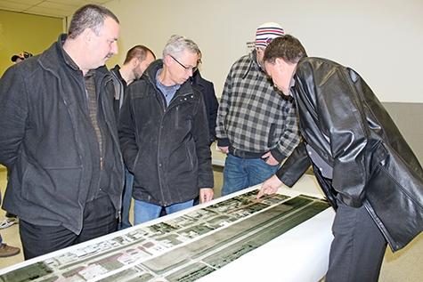 Niverville Mayor Myron Dyck speaks with residents at open house