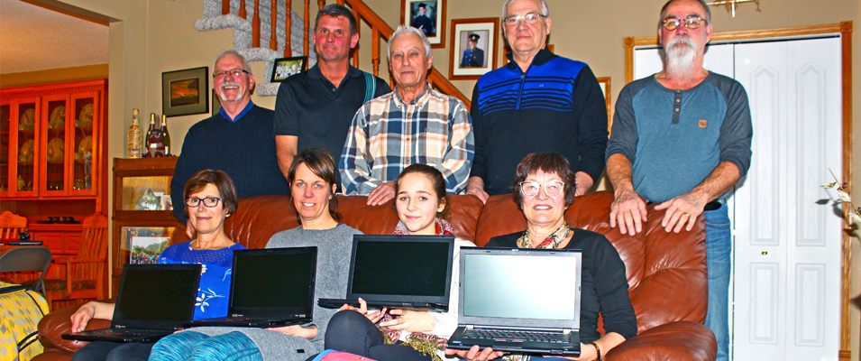 Members of Red River Mission prepare for their 2018 trip to Peru, with laptop gifts for the orphans living there