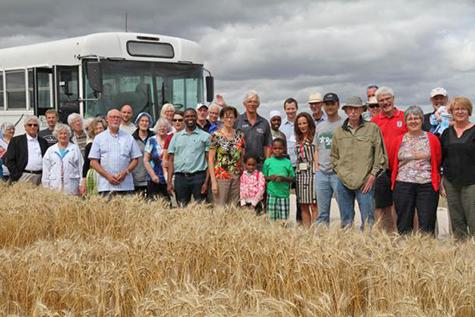The Community Bus brings people out to witness the MCC Grow Hope Project