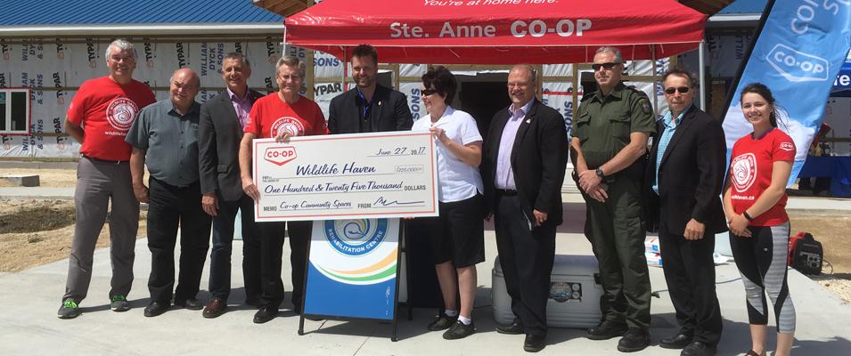 Ste. Anne Co-op presents Wildlife Haven a cheque for $125,00