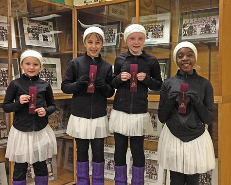 Willa Dowse, Zoe Bardal, Elizabeth Huddleston, and Miqaela Olatundun with their bronze ribbons