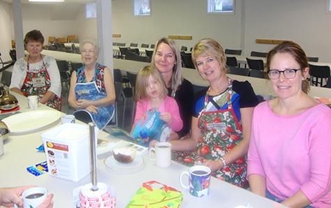 Volunteers: Mary Ann Friesen, Kayloma Capps, Tess Klassen (on lap), Marlene Stott, Meeka Sawatzky, Carisa Klassen