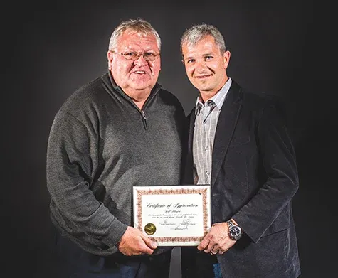 Ferd Klassen receiving certificate of appreciation at Fire/EMS appreciation night in May 2015