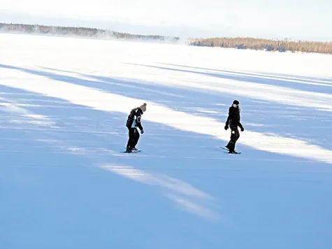 Chantel Gadient and Mackenzie Scarf snowshoeing in the Whiteshell