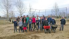 1 Volunteers Take On Baseball Diamonds Pic