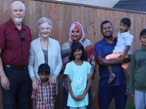 Brent and Ellen Byggdin with Abdul Paten, Sumaia Parvin, and their four children, including five-year-old Jibran.