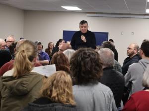 Mayor Myron Dyck addresses the crowd at an open house at the CRRC in Niverville.