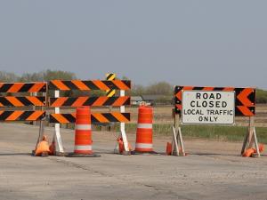 Highway 311 is closed for a three-mile stretch due to a burnt bridge. A detour is in effect.