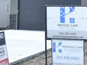 Both locally and acros the country, the real estate market is cooling down as interest rates heat up.