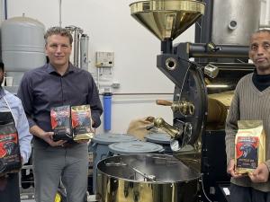 Henok Gebre, Ray Dowse, and Adam Hashi with the new Nighthawks-branded coffee.