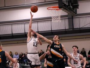 The men's basketball team on home court at the CRRC.