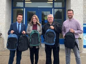 MLA Ron Schuler, Principal Shannon Philippe, Councillor Ron Mamchuk, and Vice-Principal Paul Grosskopf.