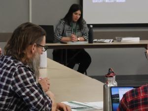 Engineers review options with gathered residents.
