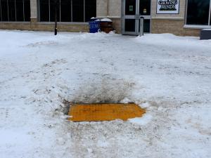 The tacile pads in front of the CRRC in Niverville. (Understandably, the pads are under a lot of snow these days...)
