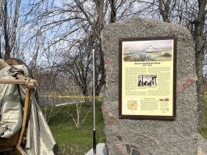 The historical cairn marking the site of the Shantz immigration sheds two miles south of Niverville.