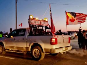 On Tuesday, January 25, crowds gathered at the Centre of Canada Park in the RM of Tache to show their support for a convoy of semi trucks and other vehicles making its way across the country in protest of a federal vaccination mandate for cross-border truckers.