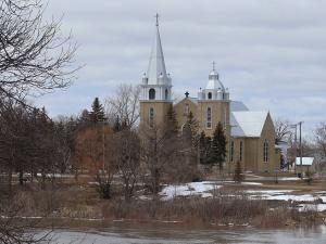 View across the Red River of the parish in Ste. Agathe.