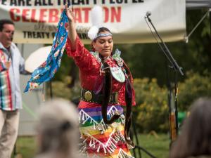 Jada Ross performs a Jingle Dress dance at the We Are All Treaty People Celebration in 2022.