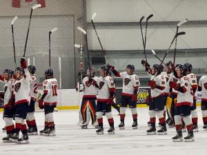 The Nighthawks celebrate victory.