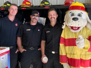 Niverville firefighters with Sparky the Fire Dog at this year's fire department open house.