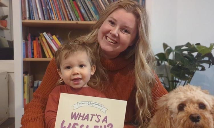 Allison Antonio with her son Wesley and dog Arthur, the inspiration behind her book.