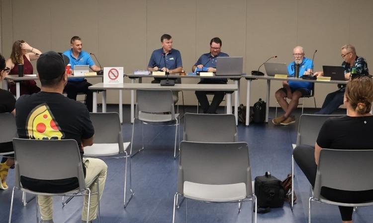 A council meeting from earlier this summer.