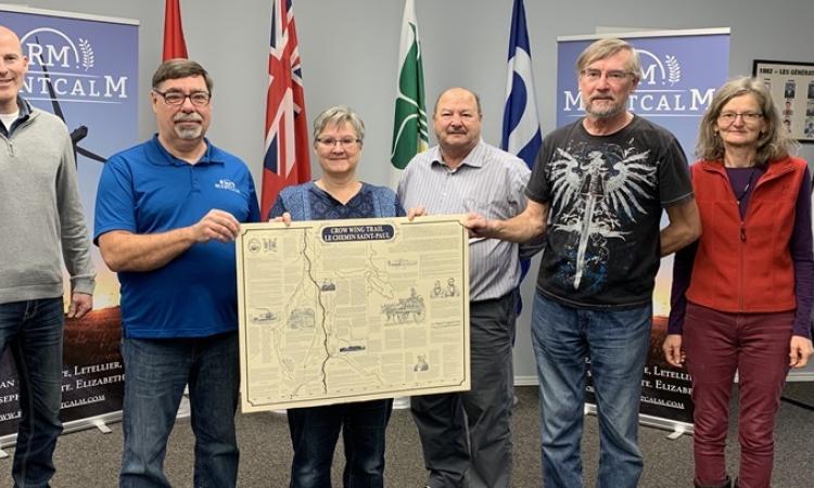 Tim Coffin, executive director of Trails Manitoba; Jean Barnabé, councillor for the RM of Montcalm; Murielle Bugera; Paul Gilmore, reeve of RM of Montcalm; Tony Dujlovic, councillor for the RM of Emerson-Franklin; and Dolores Thiel.