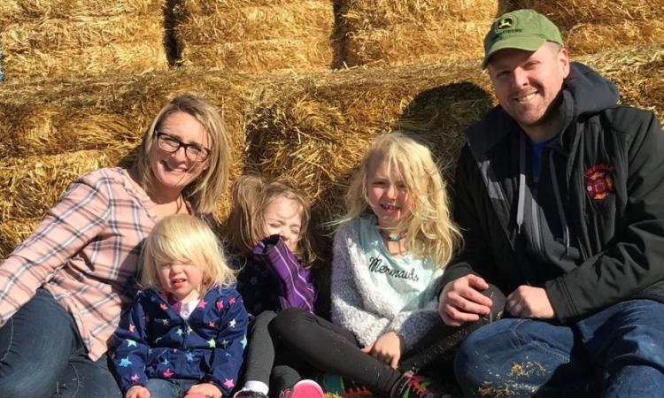 Garrett Hawgood with his wife Kate and three children