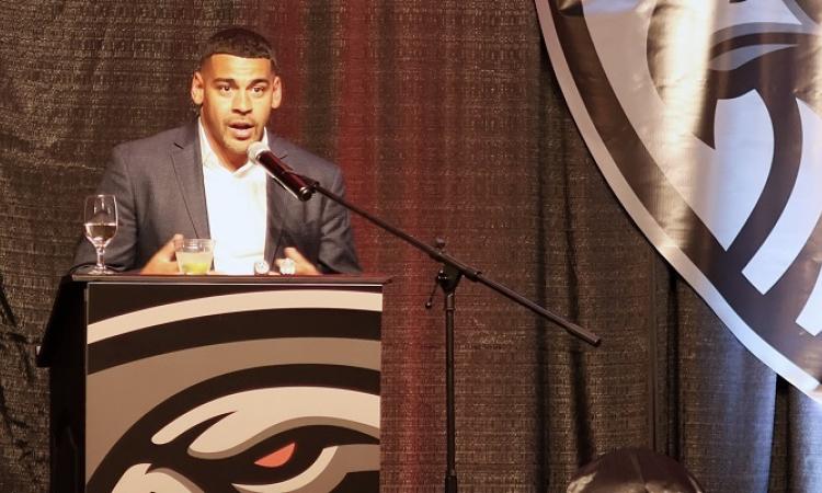 Andrew Harris, four-time Grey Cup winner, speaks at the first annual Nighthawks Red Carpet Gala.