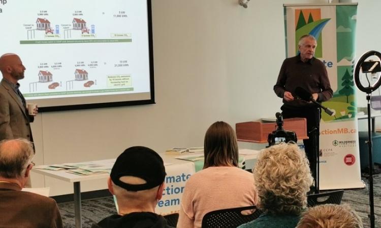Curt Hull, Ed Lohrenz, and Molly McCracken speak at a Manitoba Climate Action event.