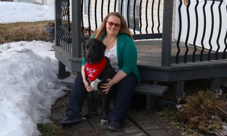 Carey Hawkins with her dog, Tundra.