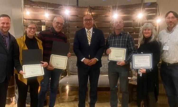 Joel Lemoine (third from right) and Lesley Gaudry (second from left) at the EDAM Fall Forum in Virden.