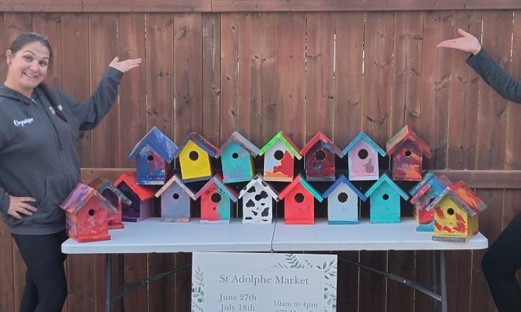 Donna Moroz and Kira Bodnarchuk showcase the new birdhouses destined for the Friendship Trail.