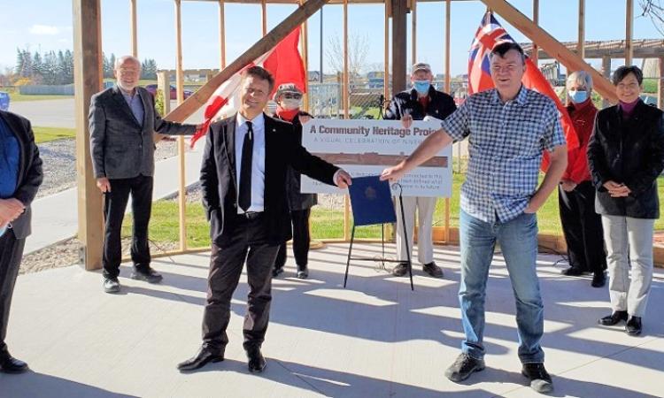 MLA Ron Schuler announces grant funding for Niverville’s new Heritage Wall.