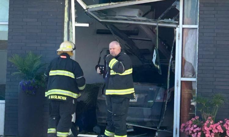 A vehicle has crashed into the front doors of Negash Coffee.