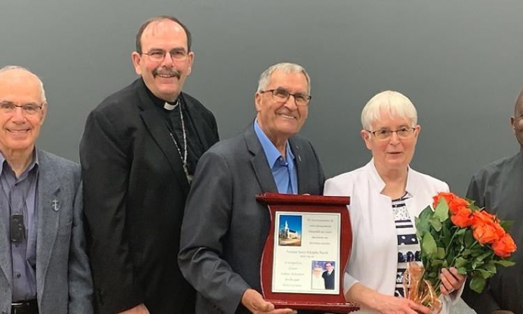 Father Gerald Michaud, Archbishop Albert LeGatt, Reginald and Ghislaine, Father Gregory Kossi Djiba.