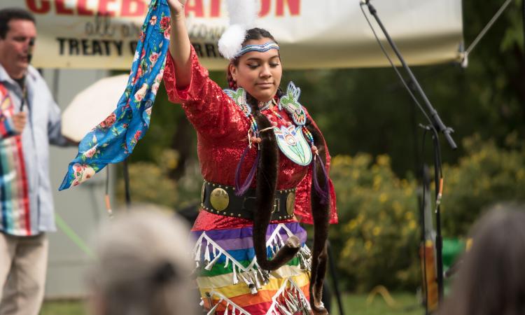Jada Ross performs a Jingle Dress dance at the We Are All Treaty People Celebration in 2022.