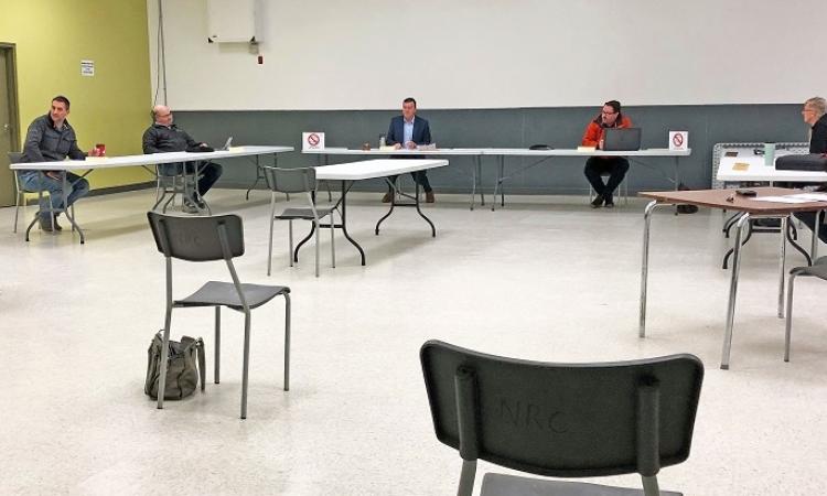Physical distancing measures are being taken at town council meetings.