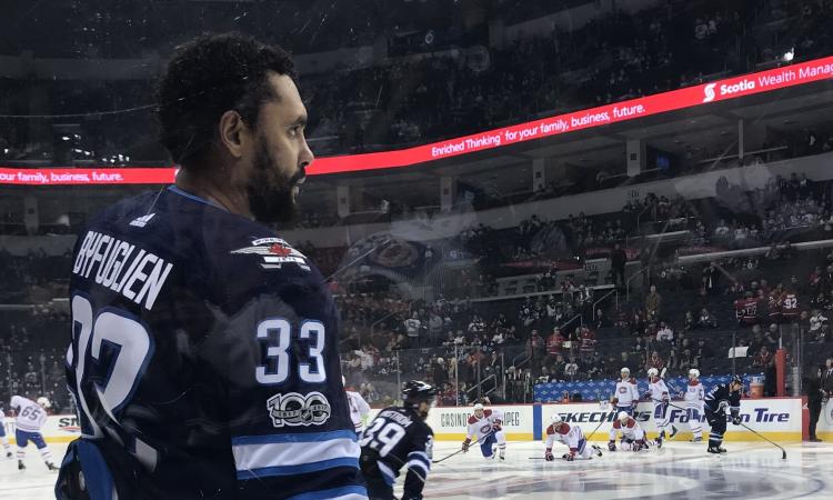Dustin Byfuglien takes the ice after a long absence due to injury.
