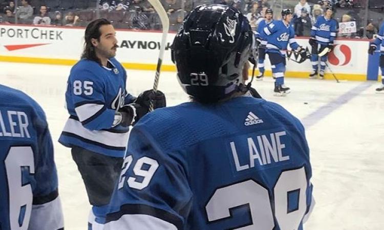 Patrik Laine takes the ice at Bell MTS Place.