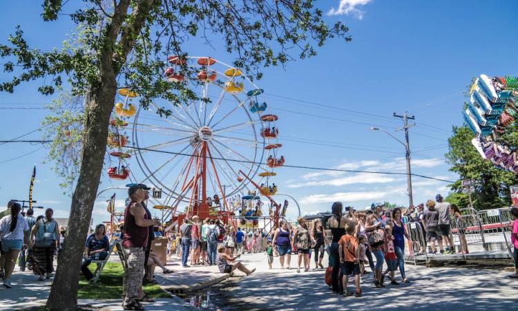 Visitors to the Olde Tyme Country Fair in Niverville.