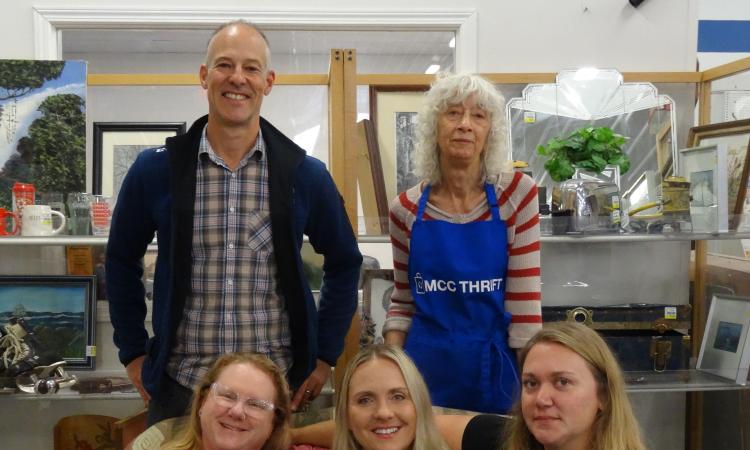 Store manager Chris Banman and the four day managers of the MCC Thrift Shop.