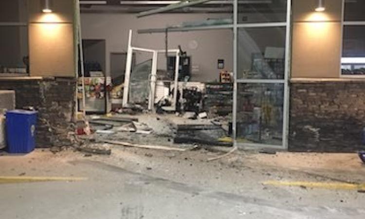 Damage from a truck breaking through the front doors of Niverville Shell.