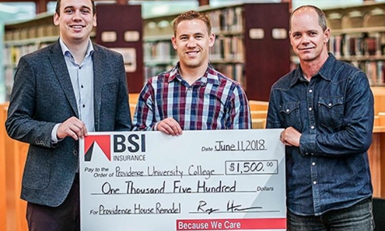 Cody Quiring of Providence, Ryan Hamm of BSI Niverville, and Dan McLeod, Providence's Director of Facilities Management