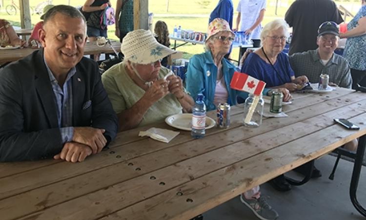 For the fourth year in a row, a pair of local politicians joined forces to host a constituency barbecue in Niverville.