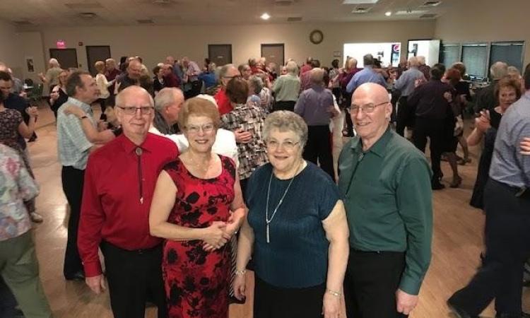 Four of the people involved with the upgrades to Pioneer Hall: Jules Manaigre, Rae Manaigre, Denise Belisle, and Romeo Belisle.